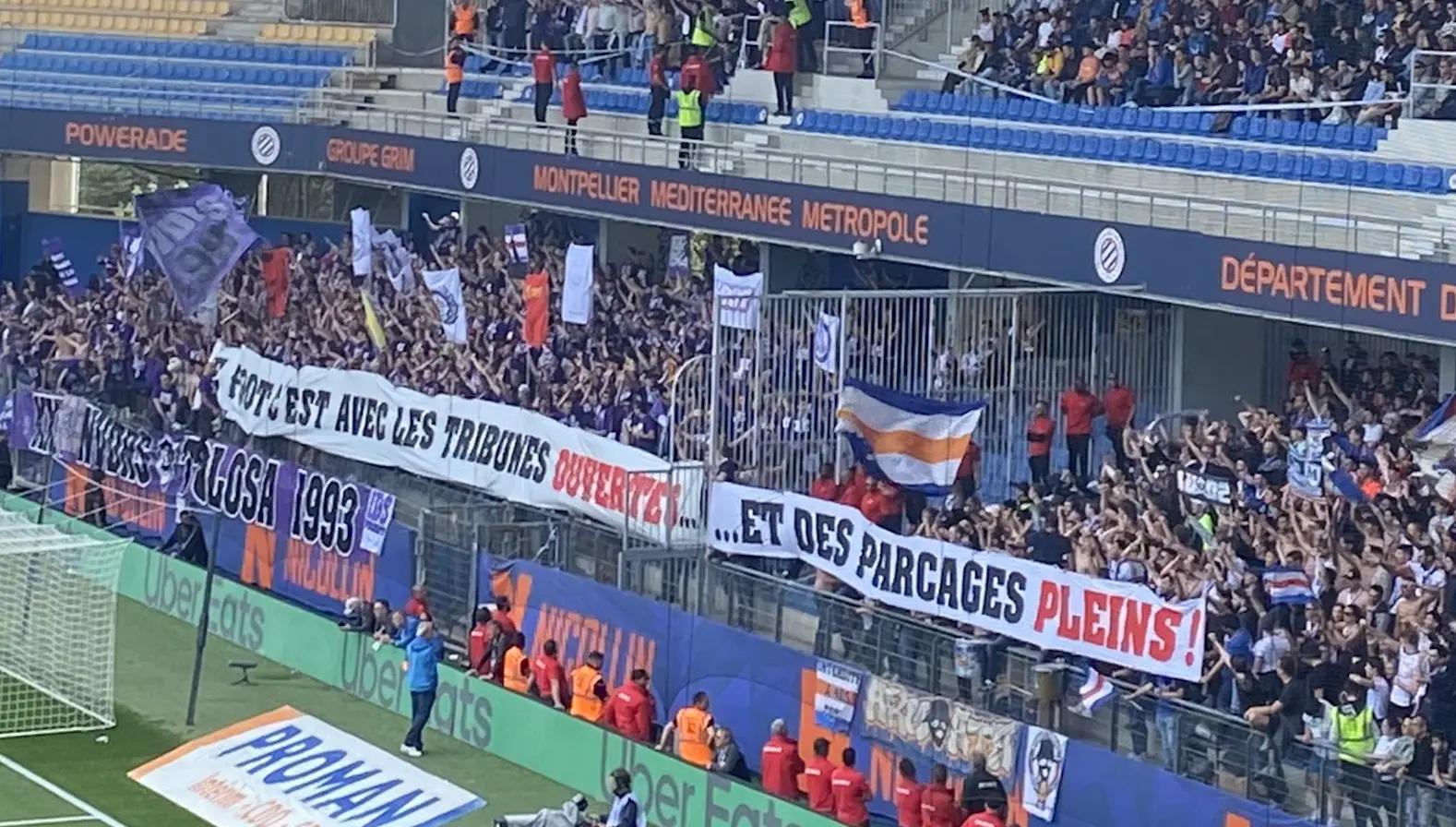 PHOTO - Quand les supporters du TFC et de Montpellier déploient une banderole commune